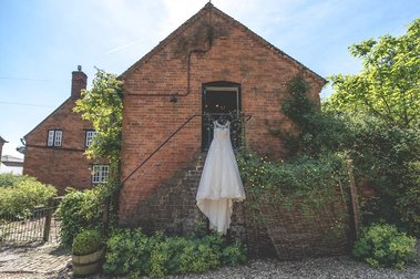Brides dress at The Dairy Barn, Norfolk.