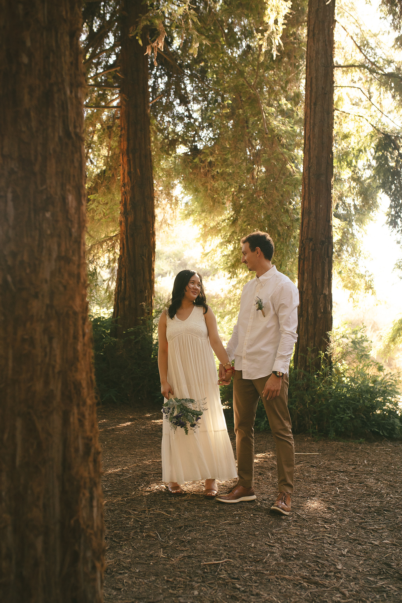 The bride and groom pose for a warm, organic portrait. An intimate, romantic elopement in the Redwoods Grove in Orange County, CA. Aly Rose Photo, wedding, elopement, engagement, portrait photographer in Southern California.