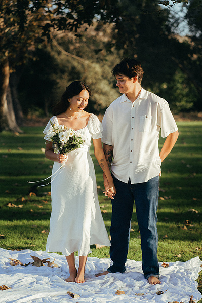 Engagement photos in Costa Mesa, CA. Two young lovebirds pose in the afternoon sun in the park. Natural light, organic, romantic, dreamy wedding, engagement, elopement, photography by Aly Rose Photo. Photographer in Southern California. 