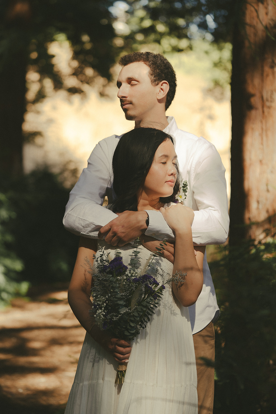 The bride and groom pose for a warm, organic portrait. An intimate, romantic elopement in the Redwoods Grove in Orange County, CA. Aly Rose Photo, wedding, elopement, engagement, portrait photographer in Southern California.