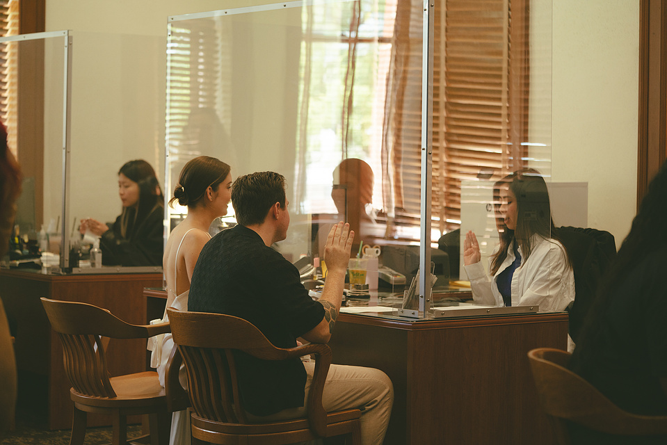 Bride and groom sign their marriage license at their courthouse wedding ceremony, Old Orange County Courthouse, Santa Ana, CA, Aly Rose Photo, natural light engagement, elopement, wedding, portrait, lifestyle photographer SoCal