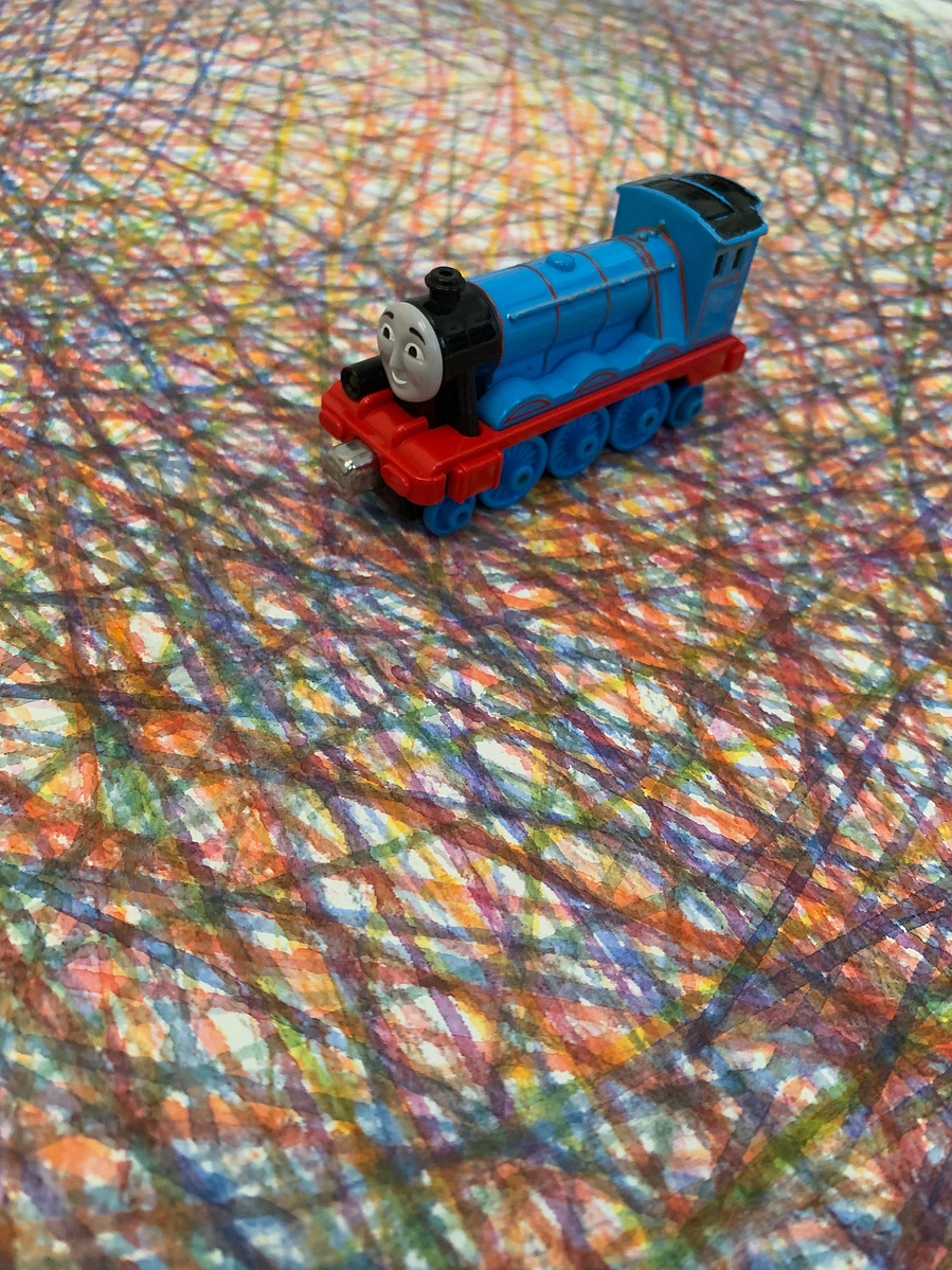 Thomas the Train toy used to paint Motherhood Hit Me Like a Train painting series