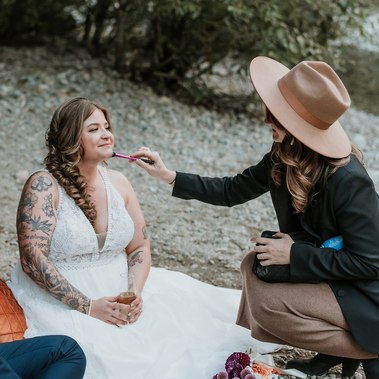 Bride getting makeup touch ups after the ceremony.
Photo Darby Magill: https://darbymagillphotography.pic-time.com/portfolio