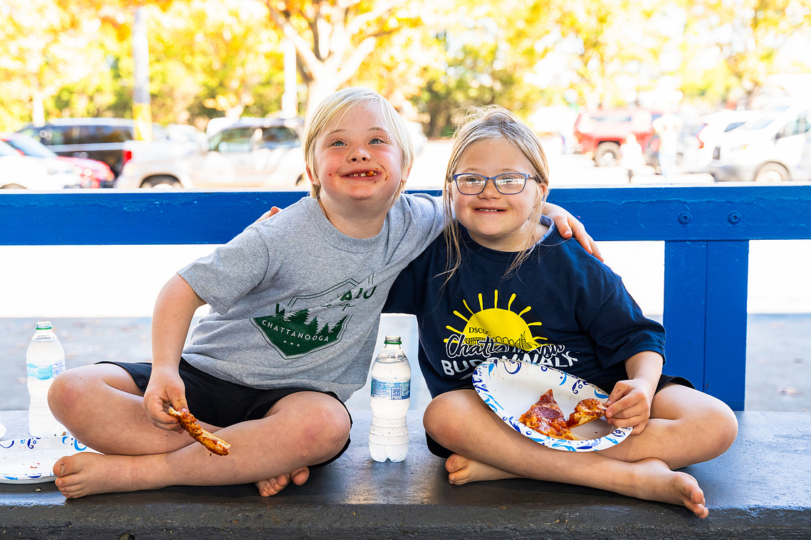 2024 Chattanooga Buddy Walk, kids eating pizza portraits