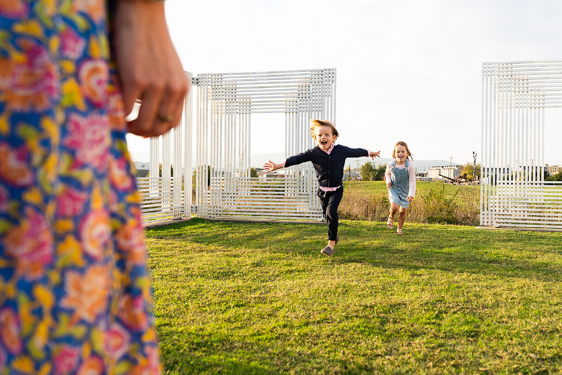 Candids of kids playing at Montague Park in Chattanooga, Tennessee running to parents