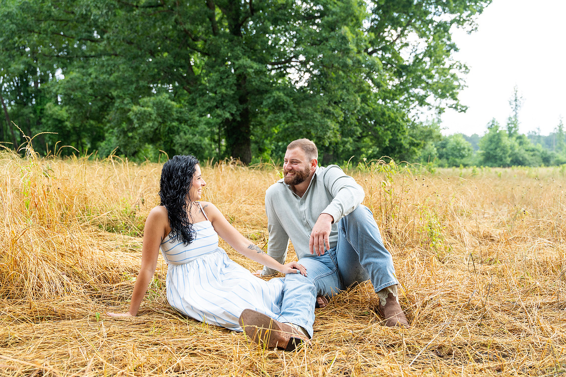 Snoopers Rock Engagement Portrait session, couple enjoying time in yellow field. 