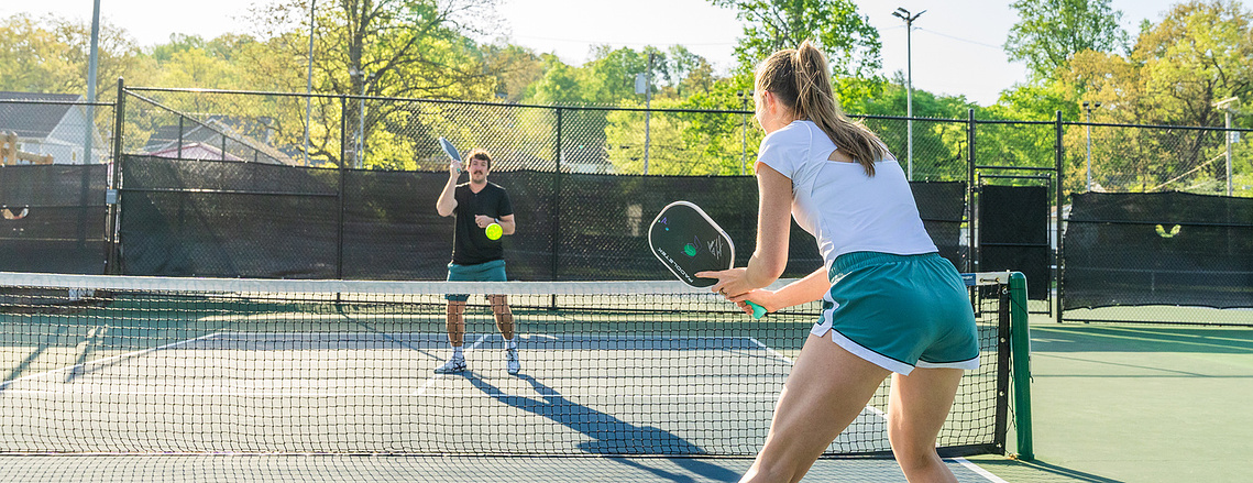 Candid outdoor pickleball lifestyle session capturing authentic moments—book your portrait session today in Chattanooga.