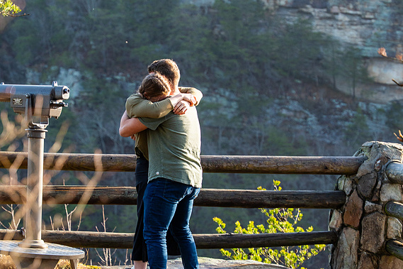 Surprise proposal at Cloudland Canyon State Park with sweeping valley views and golden morning light.