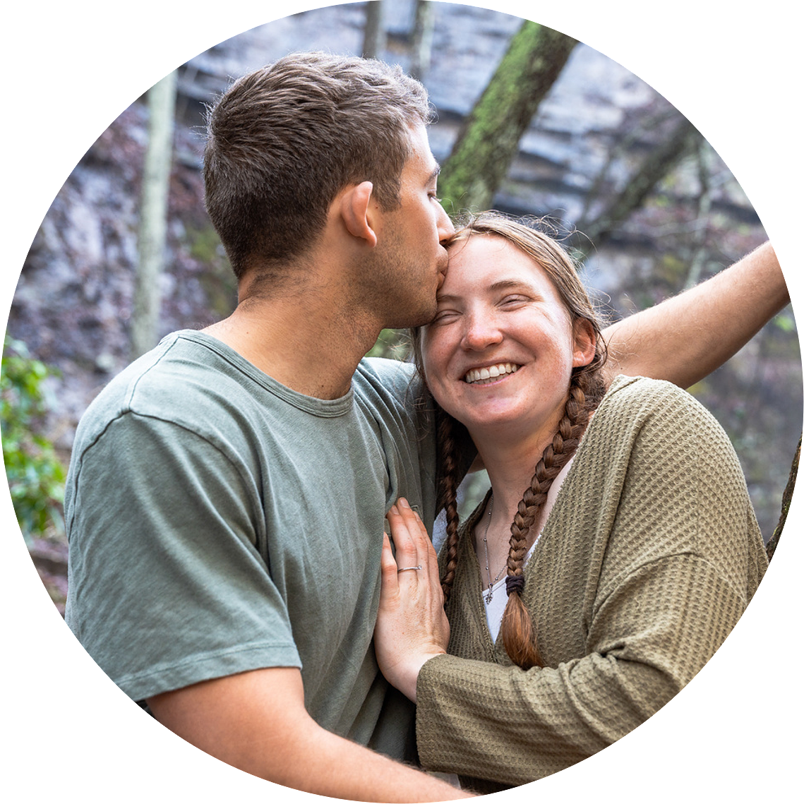 Engagement photos at Cloudland Canyon waterfall featuring romantic dancing poses and natural rock formations.