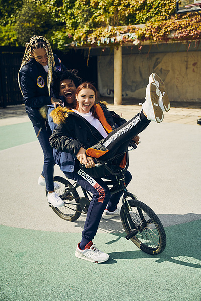 friends-smiling-fun-bike-messing-court-shot-by-matthew-stansfield