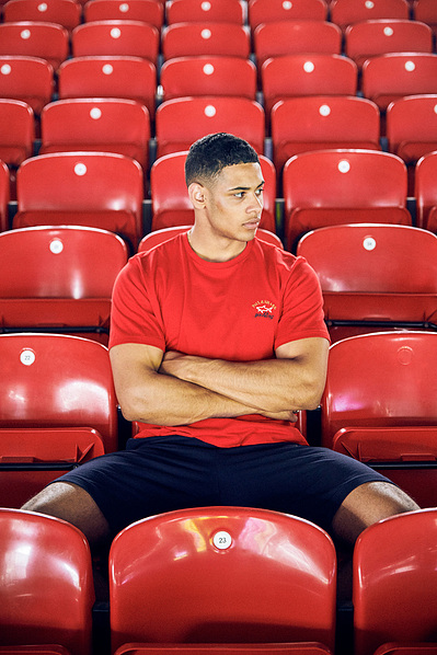 portrait-guy-sat-stadium-football-paul-shark-photography-by-matthew-stansfield