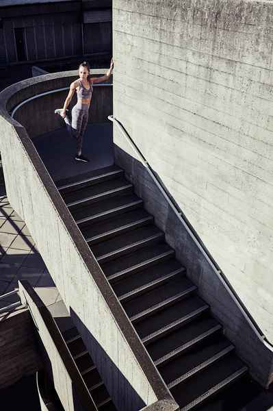 woman-stretching-concrete-steps-shot-by-matthew-stansfield