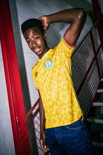 lad-smiling-Umbro-Ethiopia-shirt-shot-by-matthew-stansfield
