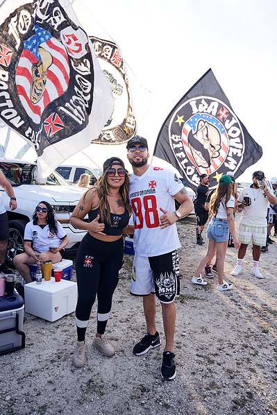 smiling-couple-flags-game-shot-by-matthew-stansfield