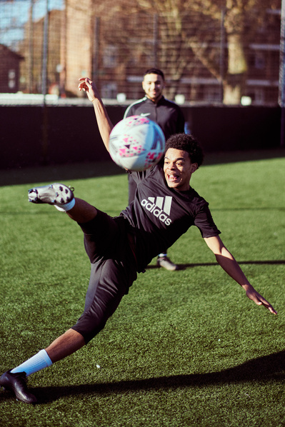 guy -kicking-football-shot-by-matthew-stansfield