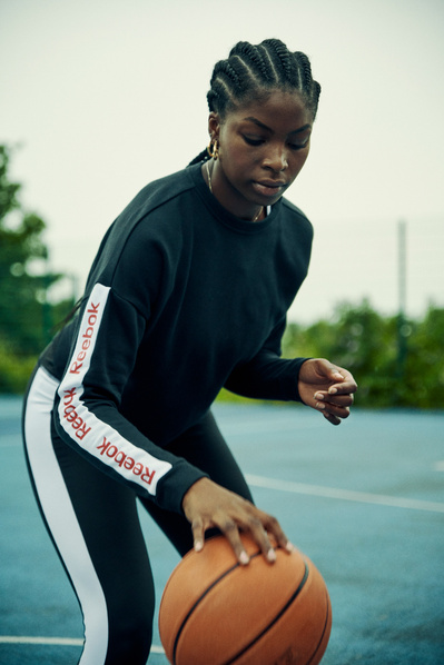 girl-wearing-reebok-playing-basketball-shot-by-matthew-stansfield