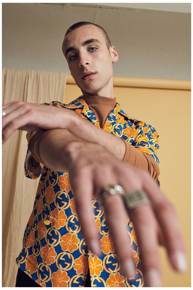 guy-shaved-head-hands-crossed-shot-by-matthew-stansfield