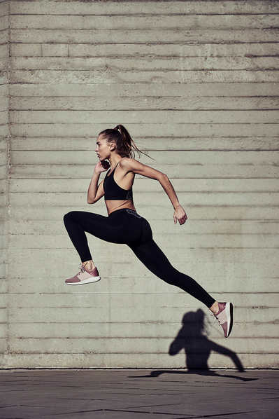 girl-running-concrete-jumping-shot-by-matthew-stansfield