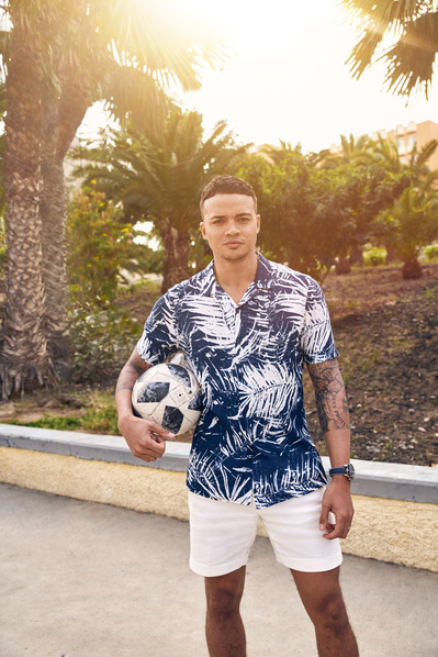 jacamo-jermaine-jenas-holding-football-shot-by-matthew-stansfield.jpg