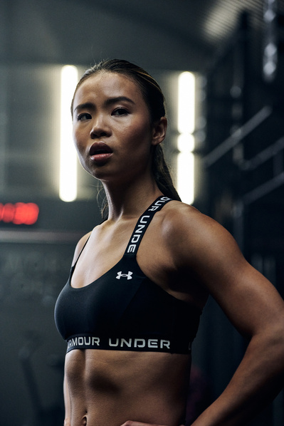 closeup portrait of athlete looking into camera in gym training fitness shot for under armour photography by matthew stansfield
