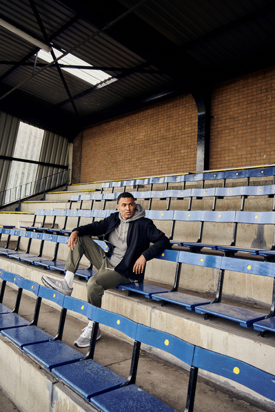 guy-sitting-football-stand-casual-shot-by-matthew-stansfield