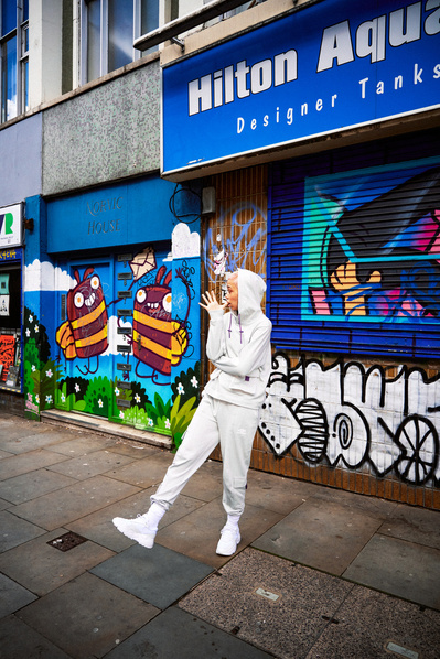 girl-tracksuit-umbro-graffiti-shop-shot-by-matthew-stansfield