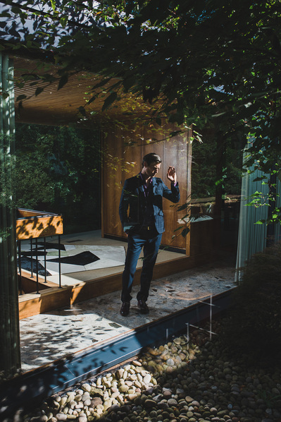 man-standing-window-retro-shot-by-matthew-stansfield
