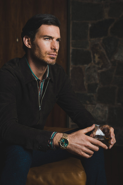 man-thinking-drinking-whisky-shot-by-matthew-stansfield