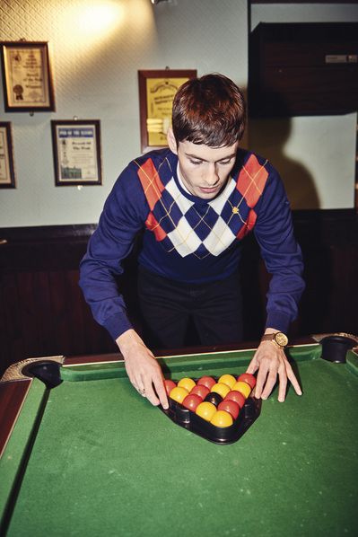 guy-playing-pool-rackingup-pub-shot-by-matthew-stansfield