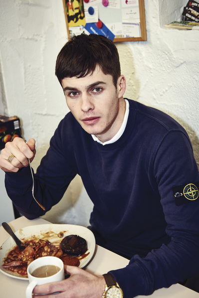 lad-eating-full-english-breakfast-cafe-shot-by-matthew-stansfield