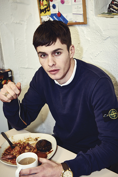 lad-eating-full-english-breakfast-cafe-shot-by-matthew-stansfield