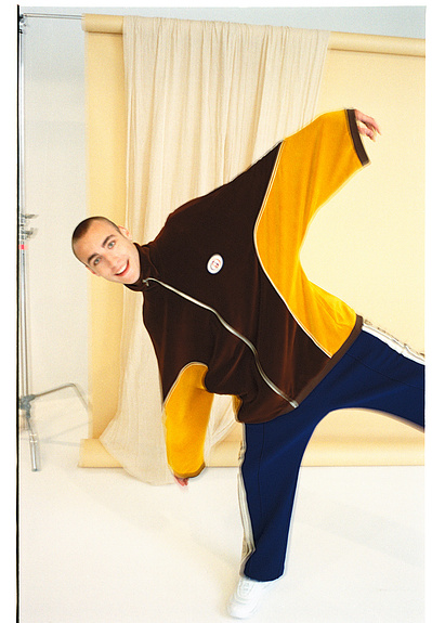 guy-smiling-retro-tracksuit-shot-by-matthew-stansfield