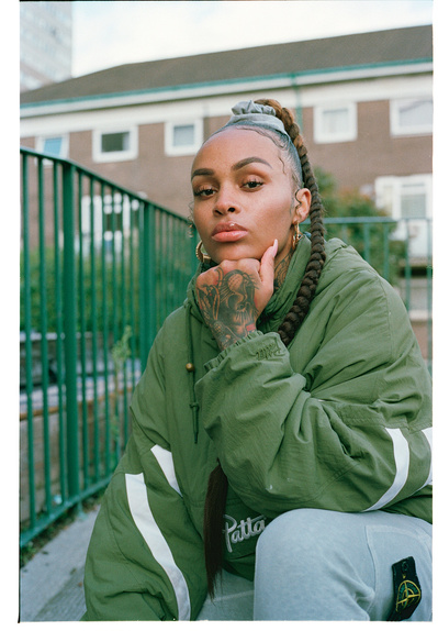girl-sitting-tattoo-railings-shot-by-matthew-stansfield