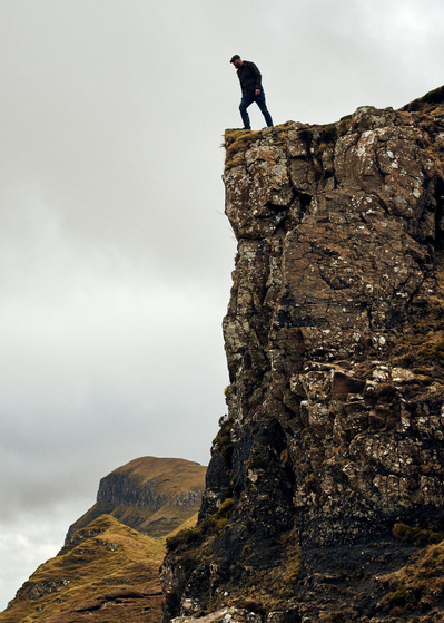 man-standing-cliff-edge-isle-of-skye-photography-by-matthew-stansfield