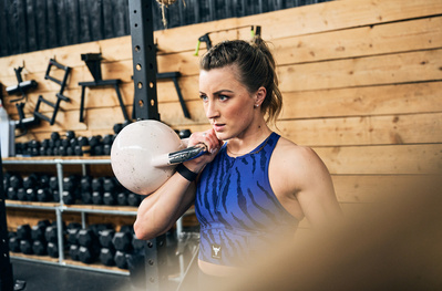 girl-athlete-exercising-weights-kettle-bell-shot-by-matthew-stansfield