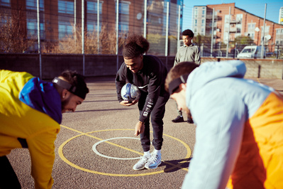 lads-playing-football-court-shot-by-matthew-stansfield