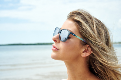 woman-sunglasses-reflection-beach-shot-by-matthew-stansfield