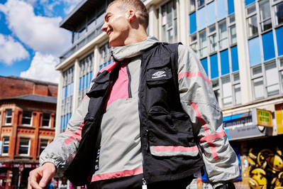 guy-smiling-crossing-road-town-umbro-shot-by-matthew-stansfield
