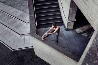 girl-stretching-concrete-steps-shot-by-matthew-stansfield