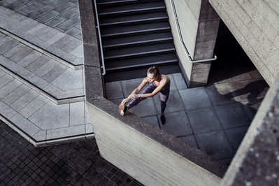 girl-stretching-concrete-steps-shot-by-matthew-stansfield
