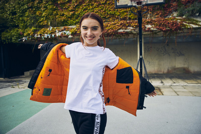 girl-smiling-putting-jacket-basketball--shot-by-matthew-stansfield