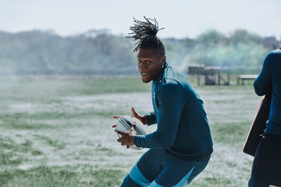 Maro-Itoje-under-armour-catching-rugby-ball-photography-by-matthew-stansfield