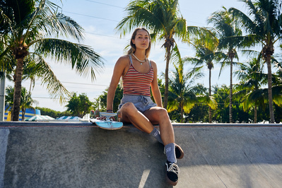 girl-sat-resting-skater-skateboard-skatepark-shot-by-matthew-stansfield