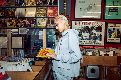 girl-vinyl-shop-looking-browsing-shot-by-matthew-stansfield