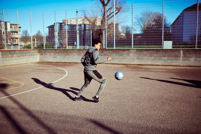 guy-playing-football-shot-by-matthew-stansfield