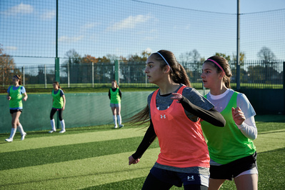 under-armour-girls-training-football-pitch-photography-by-matthew-stansfield