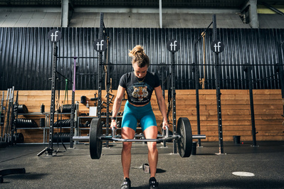 girl-athlete-gym-weightlifting-dumbbell-shot-by-matthew-stansfield