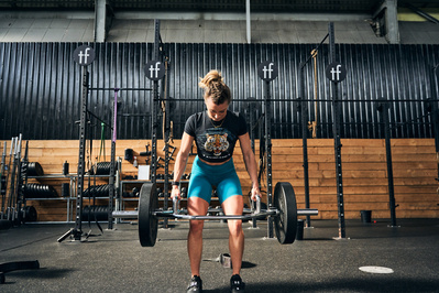 girl-athlete-gym-weightlifting-dumbbell-shot-by-matthew-stansfield