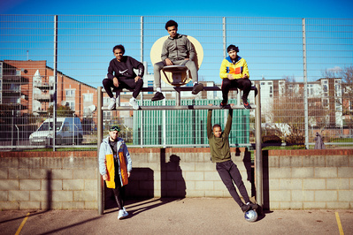 guys-hanging-sitting-basketball-court-shot-by-matthew-stansfield