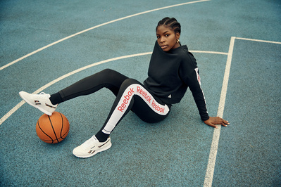 girl-wearing-reebok-sat-basketball-court-shot-by-matthew-stansfield